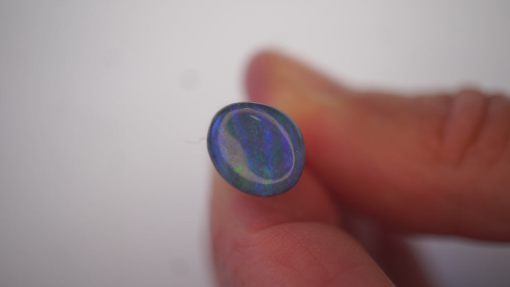 3.5ct Boulder Opal - Green & Electric Blue Fire on Blue Host Body Tone