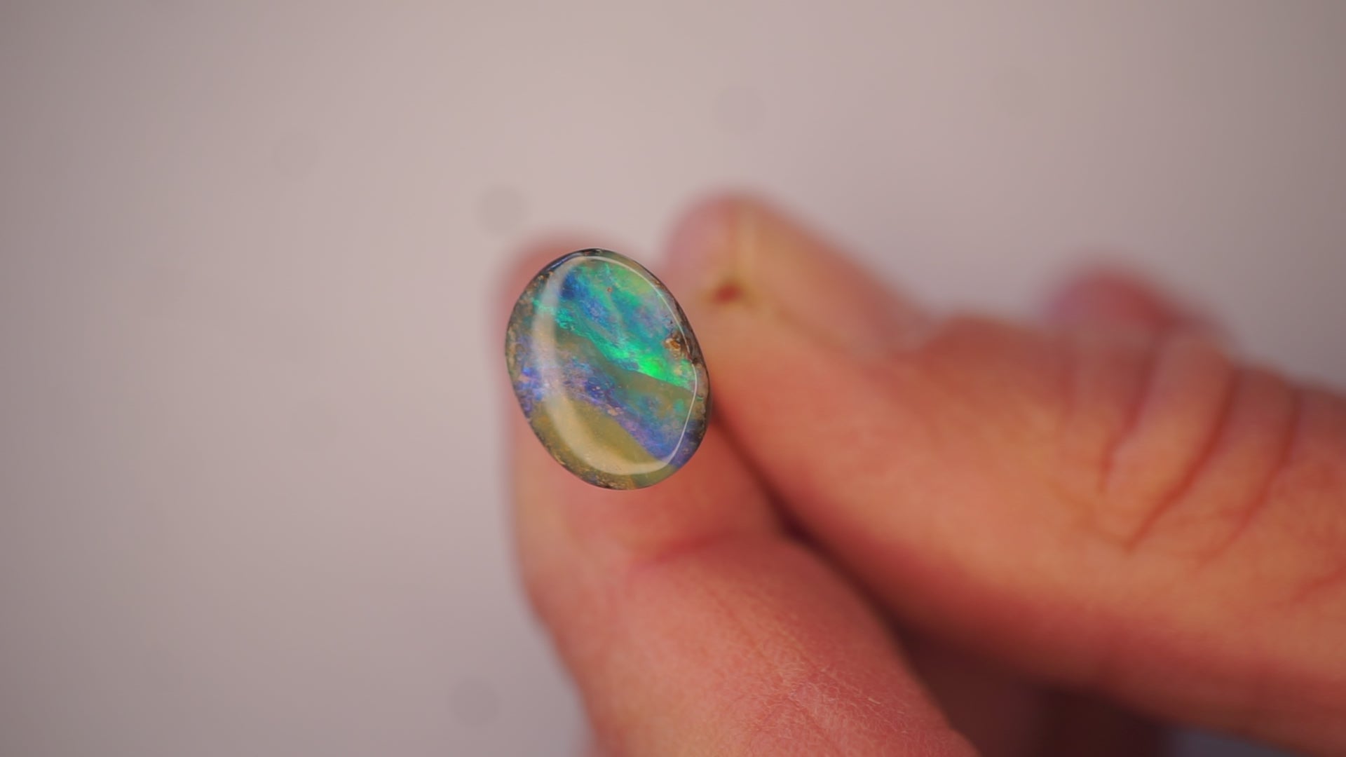 2.5ct Boulder Opal - Electric Green Sash on Blue Base