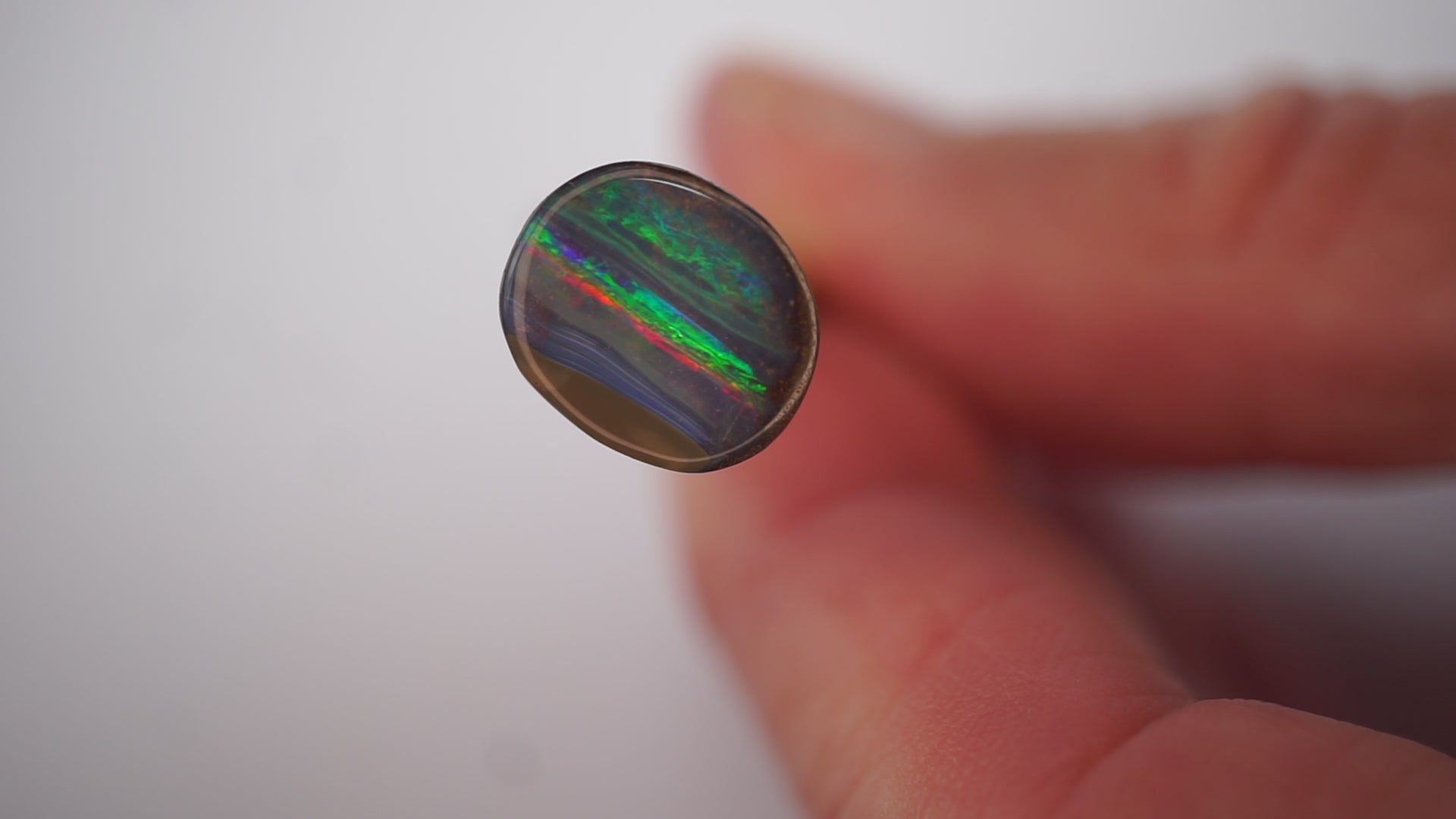3.3ct Boulder Opal - Neon Green & Crimson Streaks on Blue Host Body Tone