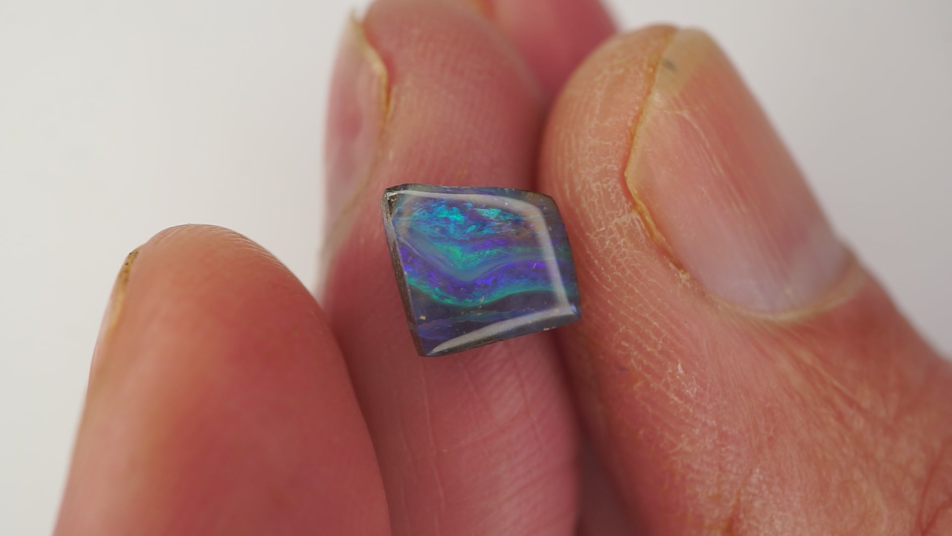 2.1ct Boulder Opal - Green & Purple Bars on Blue Host Body Tone