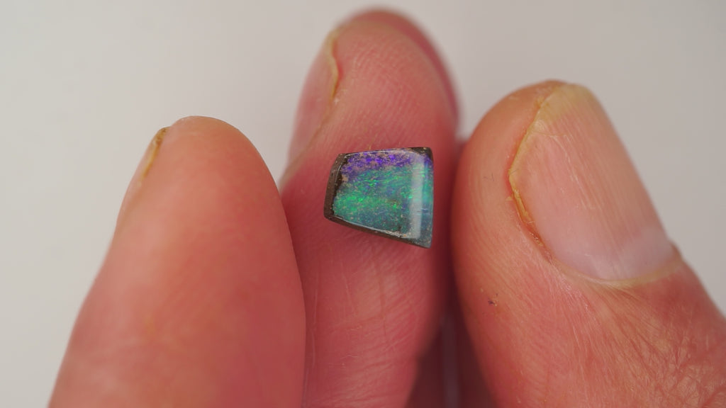 1.4ct Boulder Opal - Green Pinfire on Purple Base