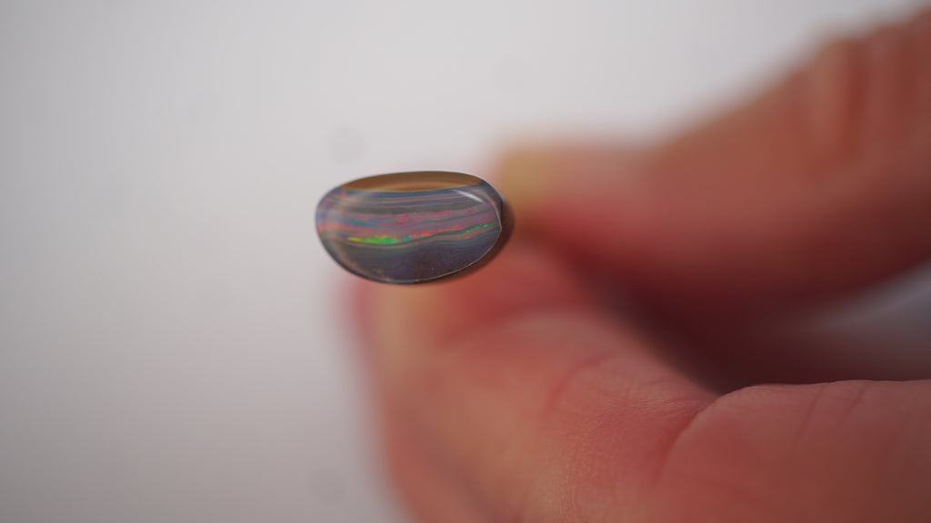 2.1ct Boulder Opal - Crimson & Green Play on Purple Host Body Tone