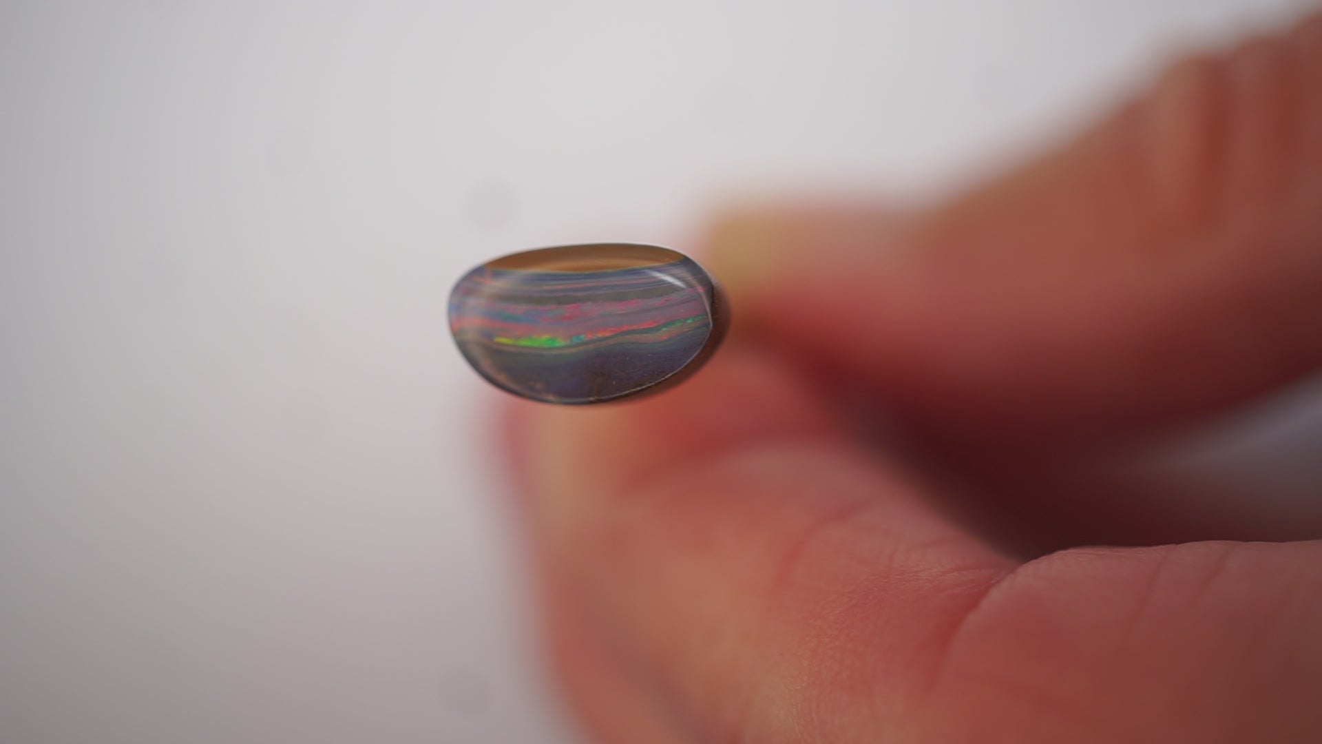 2.1ct Boulder Opal - Crimson & Green Play on Purple Host Body Tone