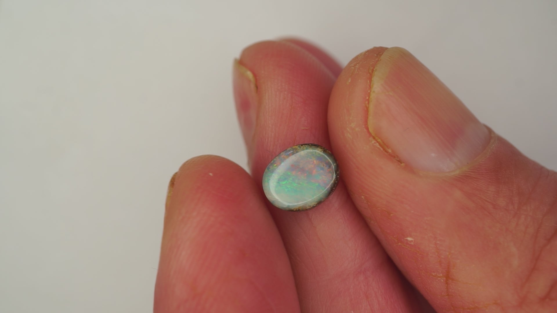 1.6ct Boulder Opal - Red & Green Pinfire Bands